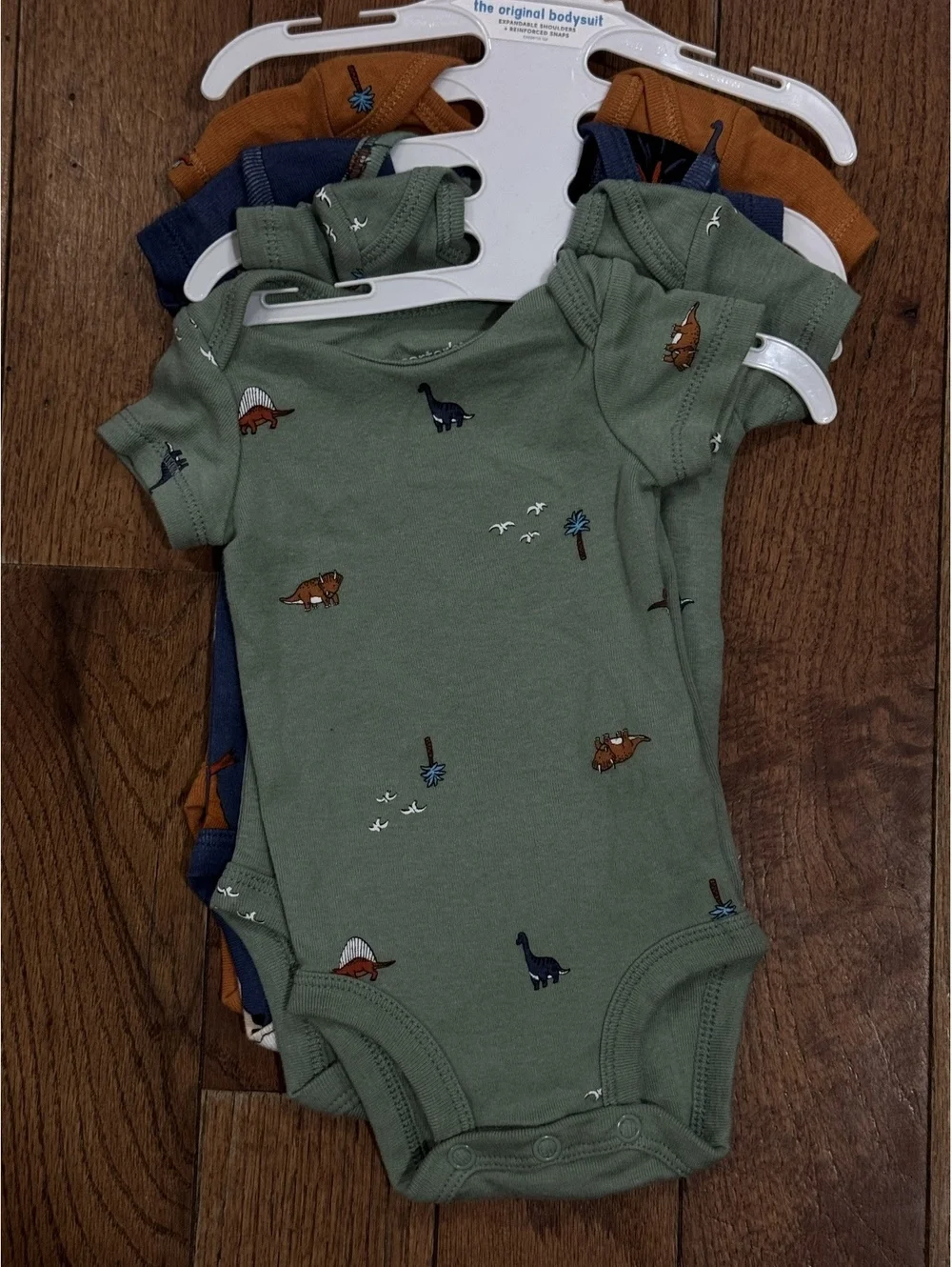 Carter's Newborn Baby Bodysuit Set with Dinosaur Prints, 3-Pack